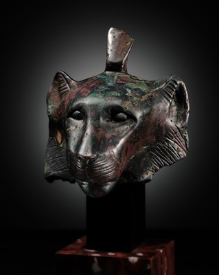 Lot 6 - THE ‘CHARLES GILLOT’ BRONZE HEAD OF WADJET AS A LIONESS, LATE PERIOD