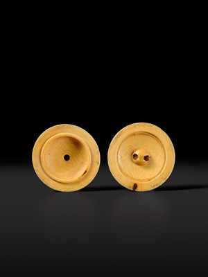 Lot 443 - KOGETSUSAI: AN IVORY SHUNGA MANJU NETSUKE OF OKAME WITH TENGU MASK