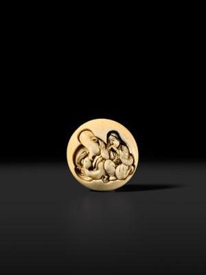 Lot 443 - KOGETSUSAI: AN IVORY SHUNGA MANJU NETSUKE OF OKAME WITH TENGU MASK