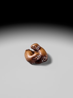 A WOOD NETSUKE OF TWO PUPPIES AT PLAY, ATTRIBUTED TO MASANAO OF KYOTO