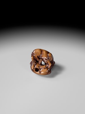 A WOOD NETSUKE OF TWO PUPPIES AT PLAY, ATTRIBUTED TO MASANAO OF KYOTO