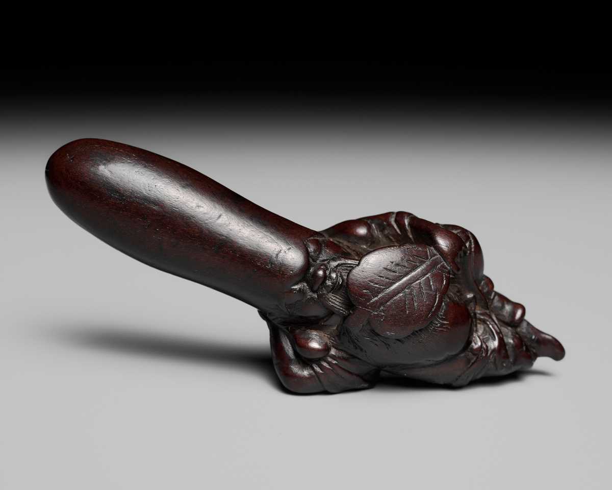 Lot 102 - A SUPERB AND RARE WOOD NETSUKE OF FUKUROKUJU TAKING A NAP