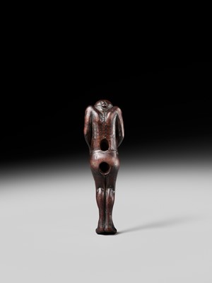 A TALL WOOD NETSUKE OF A MAN TYING HIS FUNDOSHI (LOINCLOTH), ATTRIBUTED TO AWATAGUCHI