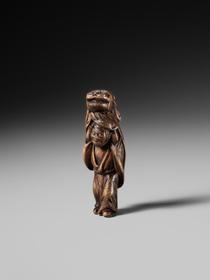 A LARGE HINOKI WOOD NETSUKE OF A SHISHIMAI DANCER