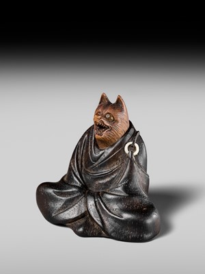Lot 170 - ANRAKU: A FINE AND HUMOROUS WOOD NETSUKE OF TANUKI DISGUISED AS A PRIEST