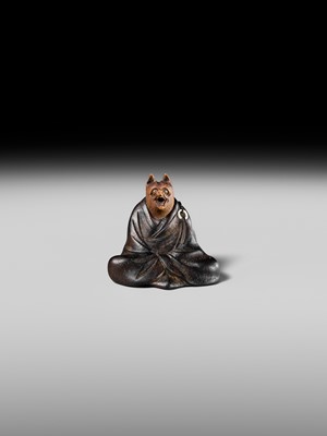 Lot 170 - ANRAKU: A FINE AND HUMOROUS WOOD NETSUKE OF TANUKI DISGUISED AS A PRIEST