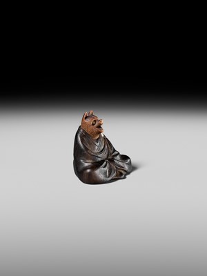 Lot 170 - ANRAKU: A FINE AND HUMOROUS WOOD NETSUKE OF TANUKI DISGUISED AS A PRIEST