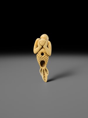 Lot 114 - A FINE IVORY NETSUKE OF A SWIMMING NINGYO (MERMAID)