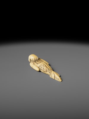 Lot 114 - A FINE IVORY NETSUKE OF A SWIMMING NINGYO (MERMAID)