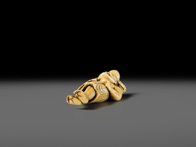 Lot 111 - A POWERFUL IVORY NETSUKE OF RYUJIN’S ATTENDANT