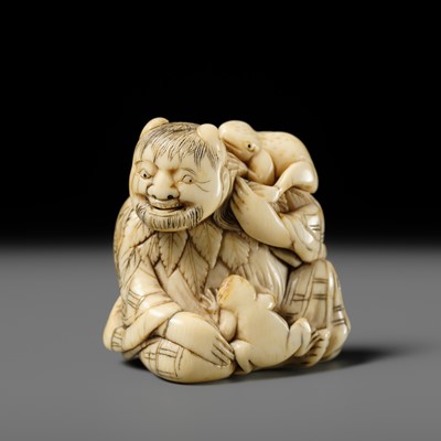 Lot 112 - A FINE IVORY NETSUKE OF GAMA SENNIN WITH TWO TOADS