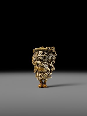 Lot 127 - A POWERFUL KYOTO SCHOOL IVORY NETSUKE OF SHOKI AND ONI
