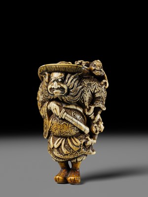 Lot 127 - A POWERFUL KYOTO SCHOOL IVORY NETSUKE OF SHOKI AND ONI