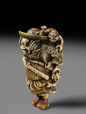 Lot 127 - A POWERFUL KYOTO SCHOOL IVORY NETSUKE OF SHOKI AND ONI