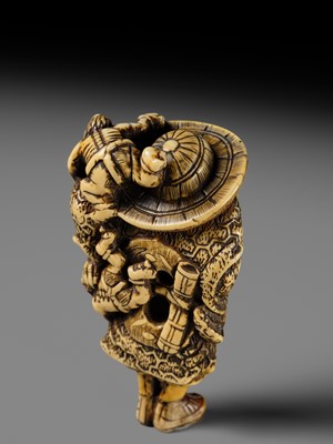 Lot 127 - A POWERFUL KYOTO SCHOOL IVORY NETSUKE OF SHOKI AND ONI
