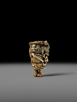 Lot 127 - A POWERFUL KYOTO SCHOOL IVORY NETSUKE OF SHOKI AND ONI