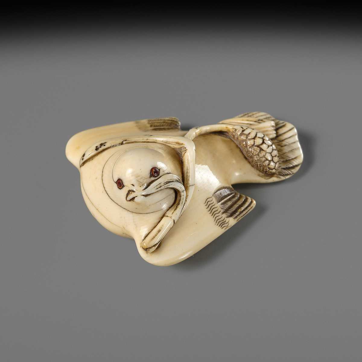 HIDEMASA: AN IVORY NETSUKE OF A FUKURA SUZUME WITH MILLET