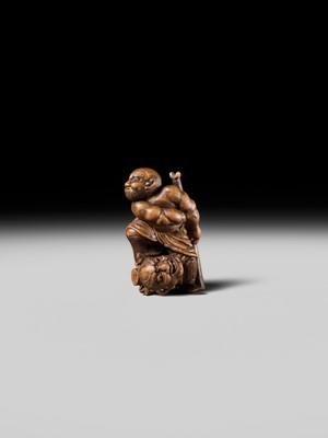 Lot 133 - A RARE WOOD NETSUKE OF ROCHISHIN