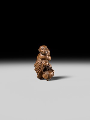Lot 133 - A RARE WOOD NETSUKE OF ROCHISHIN
