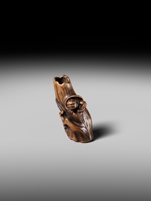 Lot 134 - MASAKAZU: A RARE WOOD NETSUKE OF AN ONI HIDING IN A TREE STUMP