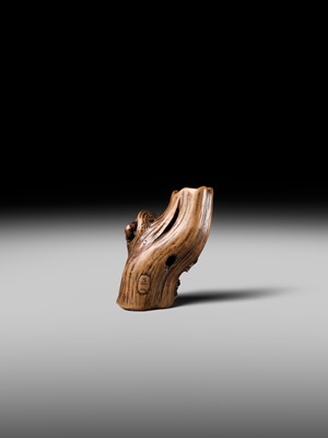 Lot 134 - MASAKAZU: A RARE WOOD NETSUKE OF AN ONI HIDING IN A TREE STUMP