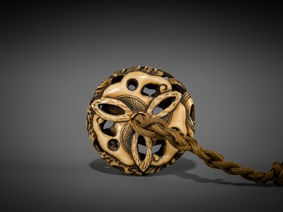 Lot 471 - A FINE ANTLER RYUSA MANJU NETSUKE DEPICTING A HAGOROMO AND PINES