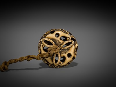 Lot 471 - A FINE ANTLER RYUSA MANJU NETSUKE DEPICTING A HAGOROMO AND PINES