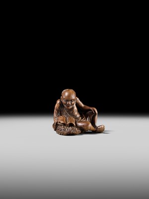 Lot 121 - A WOOD NETSUKE OF RIHAKU