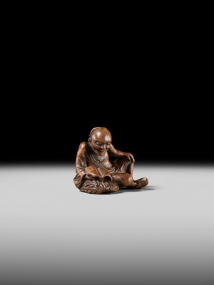 Lot 121 - A WOOD NETSUKE OF RIHAKU