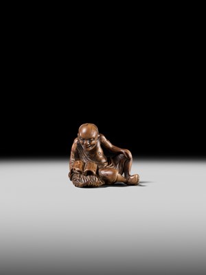 Lot 121 - A WOOD NETSUKE OF RIHAKU