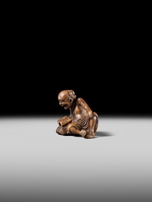 Lot 121 - A WOOD NETSUKE OF RIHAKU