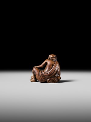 Lot 121 - A WOOD NETSUKE OF RIHAKU