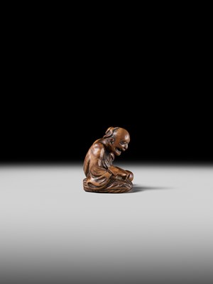 Lot 121 - A WOOD NETSUKE OF RIHAKU
