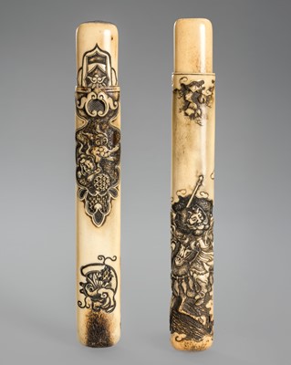 Lot 1463 - A LOT WITH TWO ANTLER KISERUZUTSU WITH A SHISHI AND SHOKI
