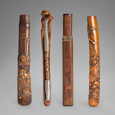 Lot 1457 - A LOT WITH FOUR WOOD AND BAMBOO KISERUZUTSU (PIPE CASE)