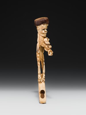 Lot 76 - AN ANTLER KISERUZUTSU (PIPE CASE) OF AN ONI WITH AN OKAME MASK