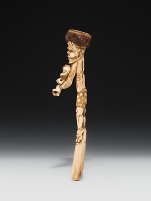 Lot 76 - AN ANTLER KISERUZUTSU (PIPE CASE) OF AN ONI WITH AN OKAME MASK