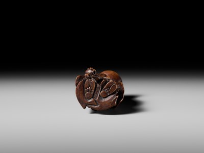Lot 175 - HIDEHARU: A NAGOYA SCHOOL WOOD NETSUKE OF A DRUNKEN SHOJO BALANCING A SAKE SAUCER