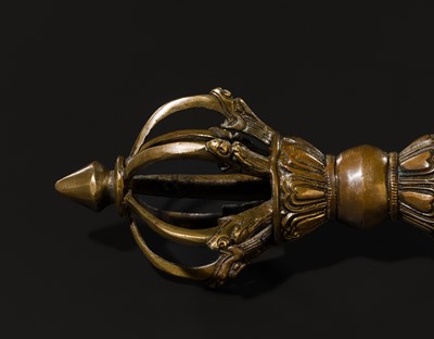 Lot 271 - A LARGE SIX-PRONGED BRONZE VAJRA, 17TH CENTURY