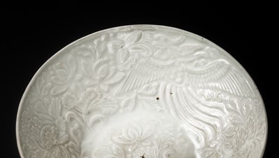 Lot 233 - A DING-TYPE ‘LOTUS AND PHOENIX’ BOWL, SOUTHERN SONG DYNASTY