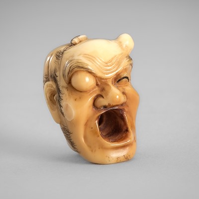 Lot 351 - AN UNUSUAL IVORY NETSUKE OF A BLIND SINGER