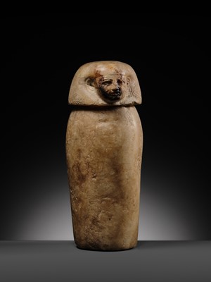 Lot 31 - AN ALABASTER ‘IMSETY’ CANOPIC JAR AND LID, LATE PERIOD
