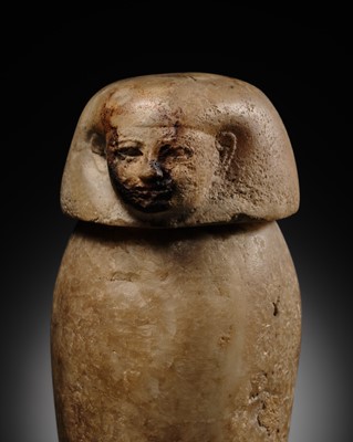 Lot 31 - AN ALABASTER ‘IMSETY’ CANOPIC JAR AND LID, LATE PERIOD
