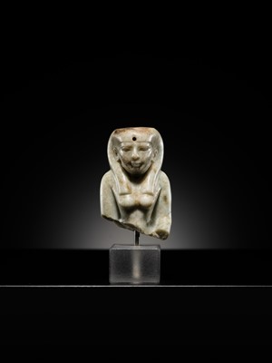Lot 11 - AN OPHICALCITE BUST OF A FEMALE DEITY, PROBABLY ISIS, LATE PERIOD, DYNASTY XXV–XXVI
