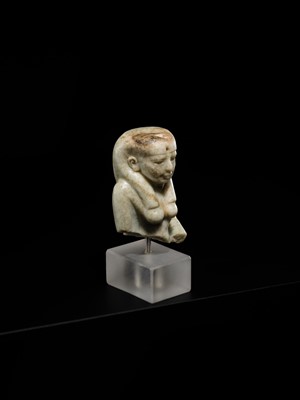 Lot 11 - AN OPHICALCITE BUST OF A FEMALE DEITY, PROBABLY ISIS, LATE PERIOD, DYNASTY XXV–XXVI