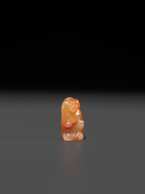 Lot 40 - A CARNELIAN ‘BABOON’ AMULET, THOTH, LATE PERIOD TO PTOLEMAIC ERA