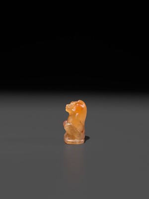Lot 40 - A CARNELIAN ‘BABOON’ AMULET, THOTH, LATE PERIOD TO PTOLEMAIC ERA