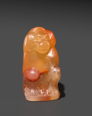 Lot 40 - A CARNELIAN ‘BABOON’ AMULET, THOTH, LATE PERIOD TO PTOLEMAIC ERA