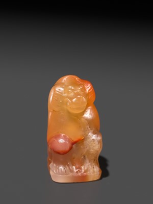 Lot 40 - A CARNELIAN ‘BABOON’ AMULET, THOTH, LATE PERIOD TO PTOLEMAIC ERA