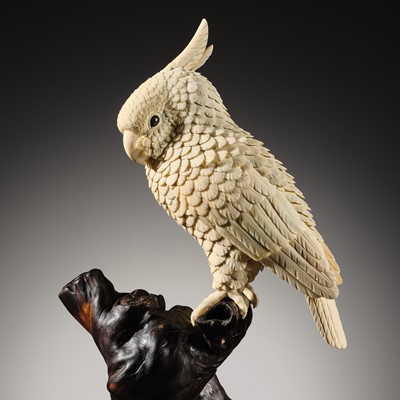 A MASTERFUL AND MONUMENTAL SECTIONAL IVORY OKIMONO OF A COCKATOO